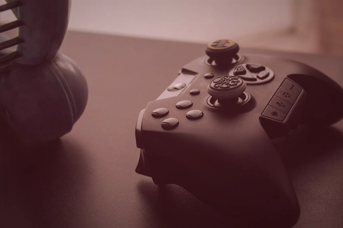 Two players concentrating on a screen, controllers in hand, during a console afternoon